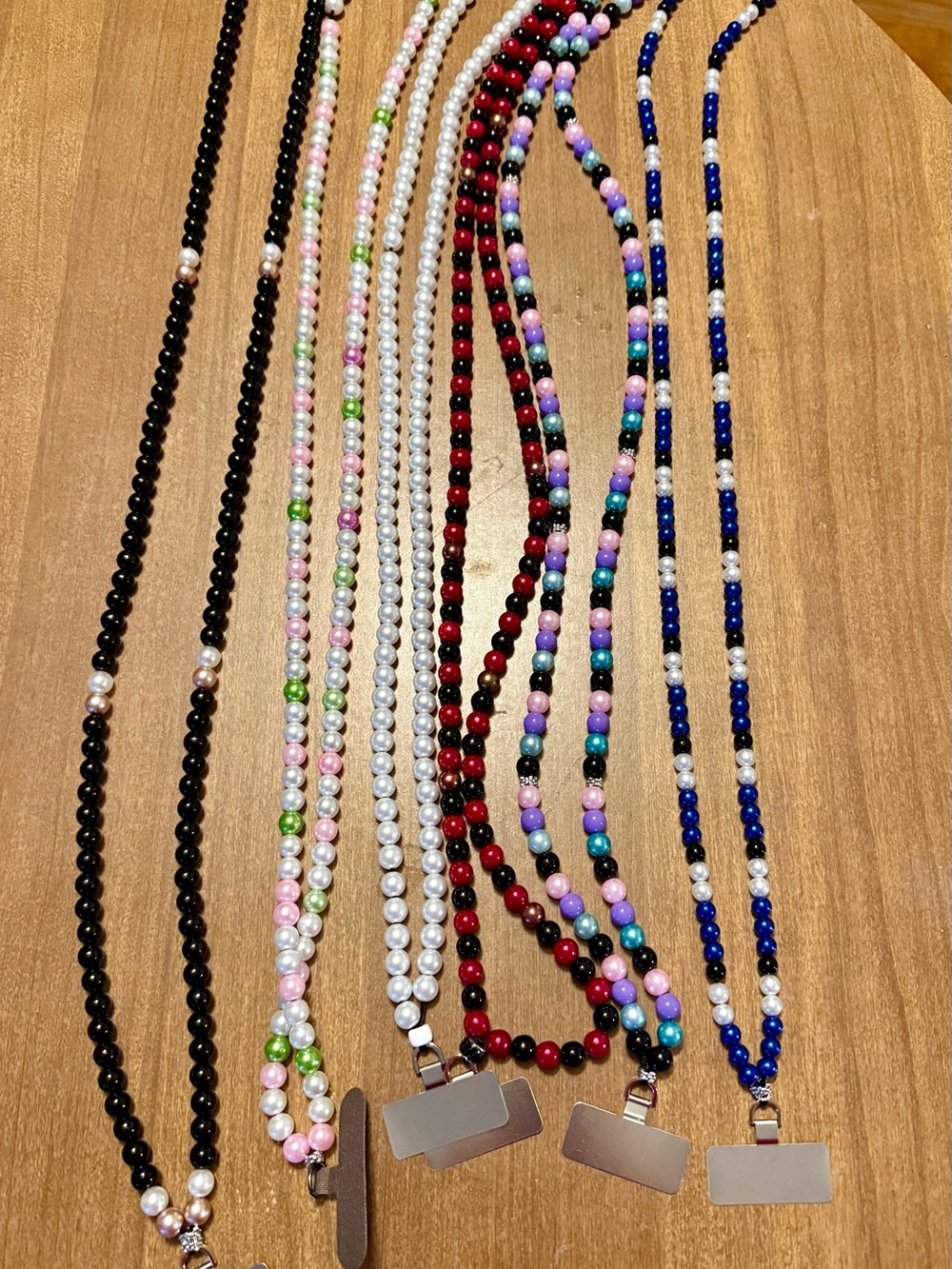 Wrist Length Phone Grips and Over the shoulder Phone lanyards